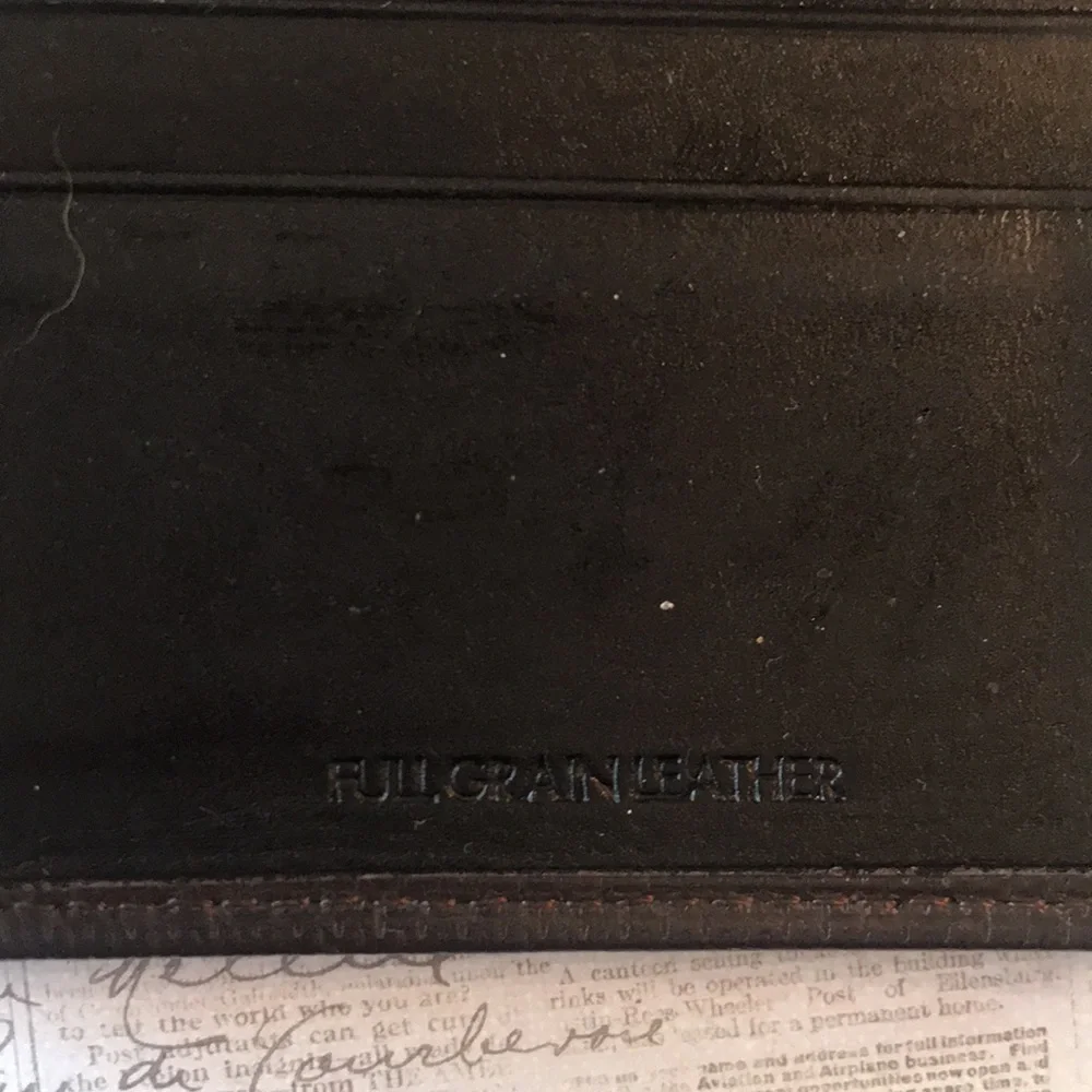Calvin Klein Textured Leather Bi-Fold Wallet